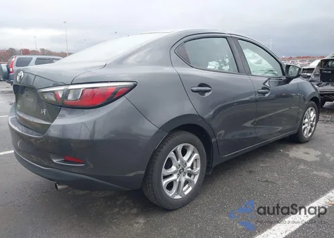 2018 Toyota Yaris Ia из США, поврежденный, VIN 3MYDLBYV6JY318850